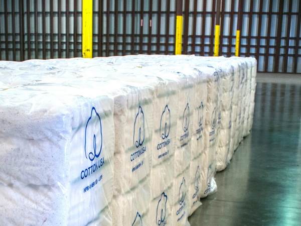 bales of cotton in a warehouse